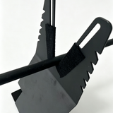 ARW hand wrapper tool close-up of black serrated grips on a bar