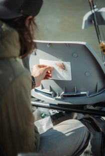 Mag Pad with a rectangular tray and mounted lures inside a tackle case