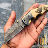 Custom Handmade Damascus Steel Engraved Folding Pocket Knife with Hand Engraved Bone Handle and Leather Case by KBS Knives Store.