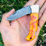 Custom Handmade Damascus Steel Top Best Folding Pocket Knife with Epoxy Resin Handle and Leather Case by KBS Knives Store.