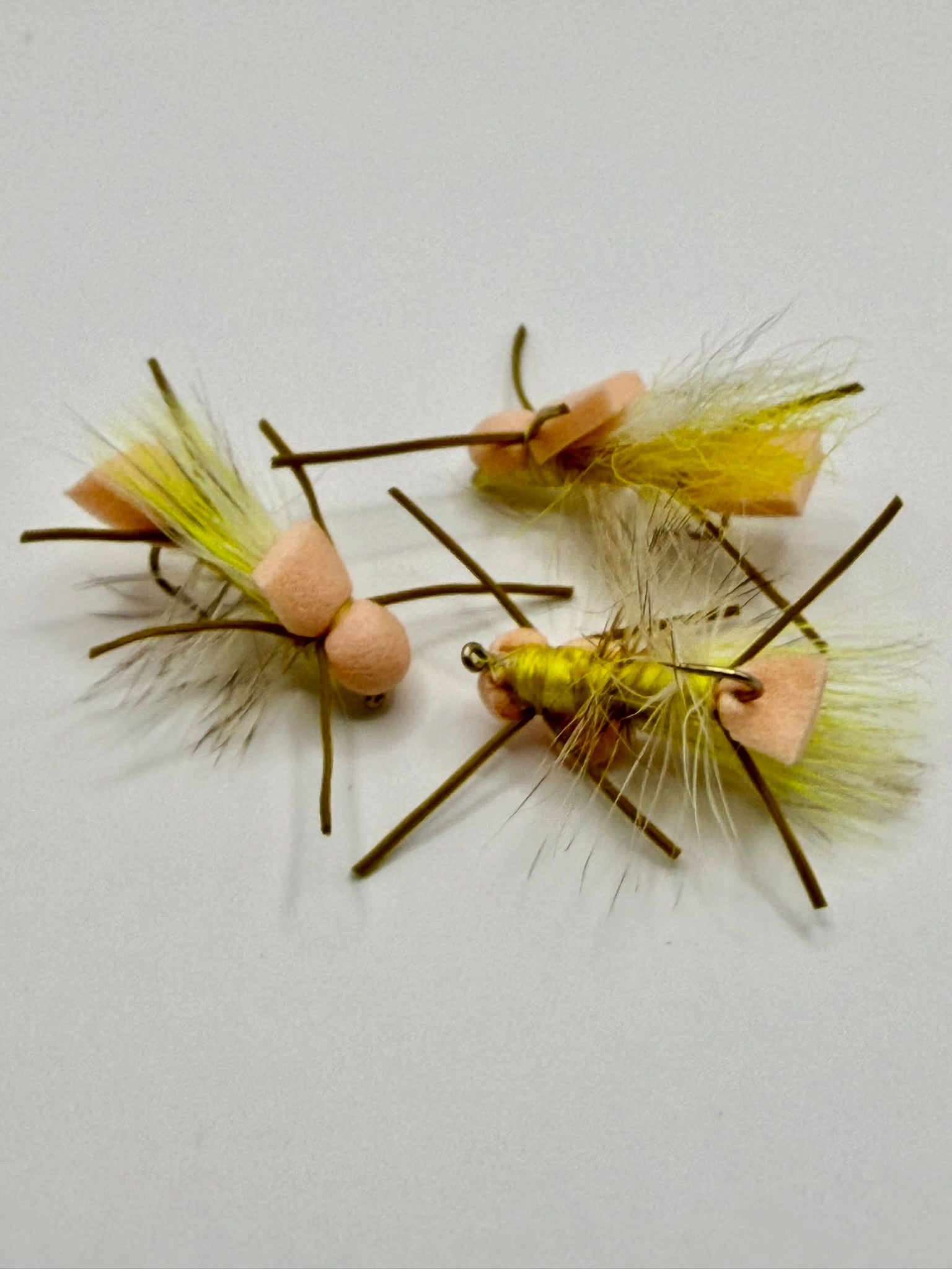 Larimeers Yellow Sally fly lure with yellow feathers and tinsel, foam body and hook