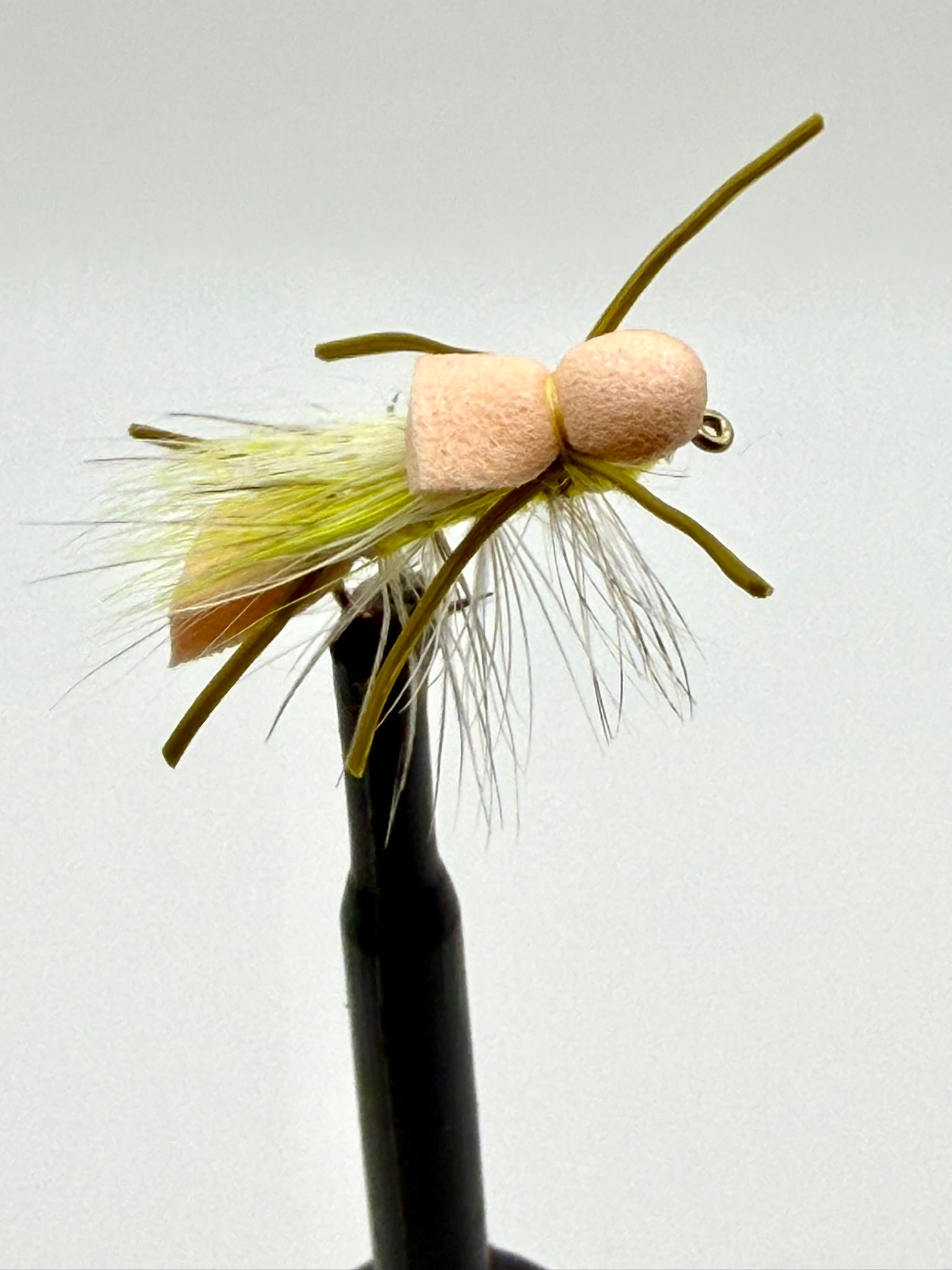 Larimeers Yellow Sally fly lure with yellow feather skirt and foam head, metal hook