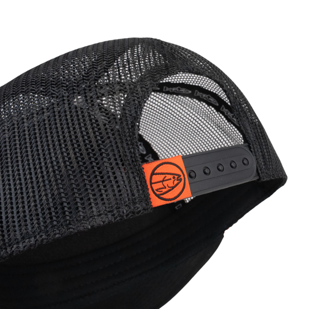 Black STLHD trucker cap with orange logo tag and side breathable mesh panel