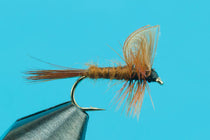Brown mayfly dry fly with upright wings and barbed hook
