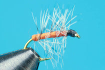 Orange Asher fly with orange dubbed body, gold hook, black head, and small tail fibers