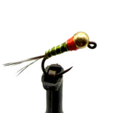 Bead-head fishing fly with gold bead, green/red striped body, black hook, trailing fibers