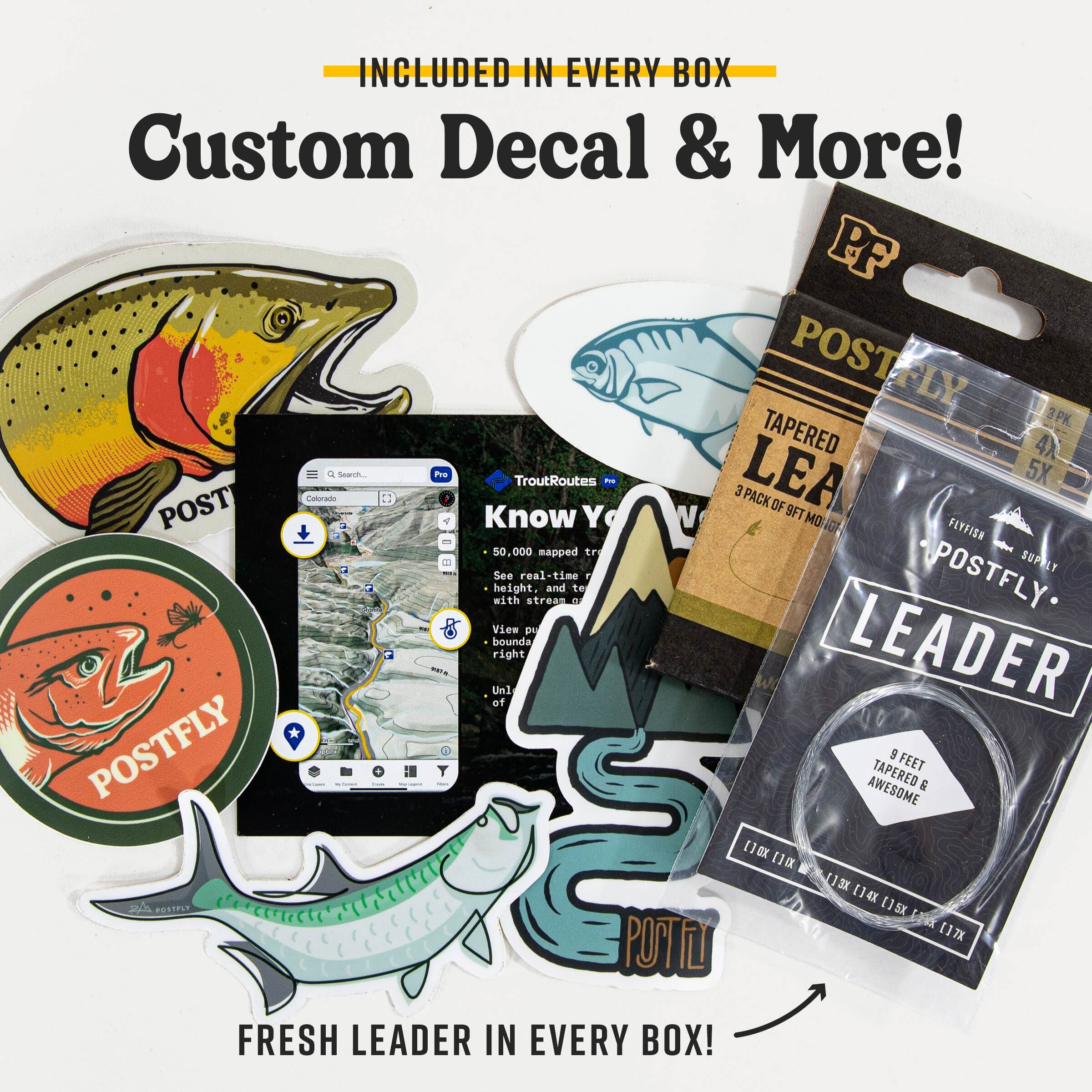 Fly tying kit accessories with custom decals and a leader line package.