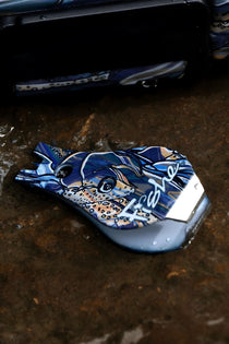 Rainbow Ridge nippers with blue graffiti-style print and white sole