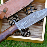 Wilderness Guardian: Hunting Bowie Knife with Damascus Steel Blade, Rosewood Handle, Brass Spacers, Damascus Guard, and Leather Sheath