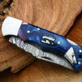 Damascus Handmade Custom Folding Pocket Knife with Epoxy Resin and Steel Bolster Handle, 3-inch Blade Length