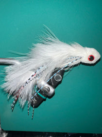 Sex Dungeon white feather fly lure with red eye and silver metal head