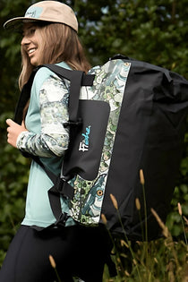 Fish-print dry bag duffel with black shoulder straps and front logo patch