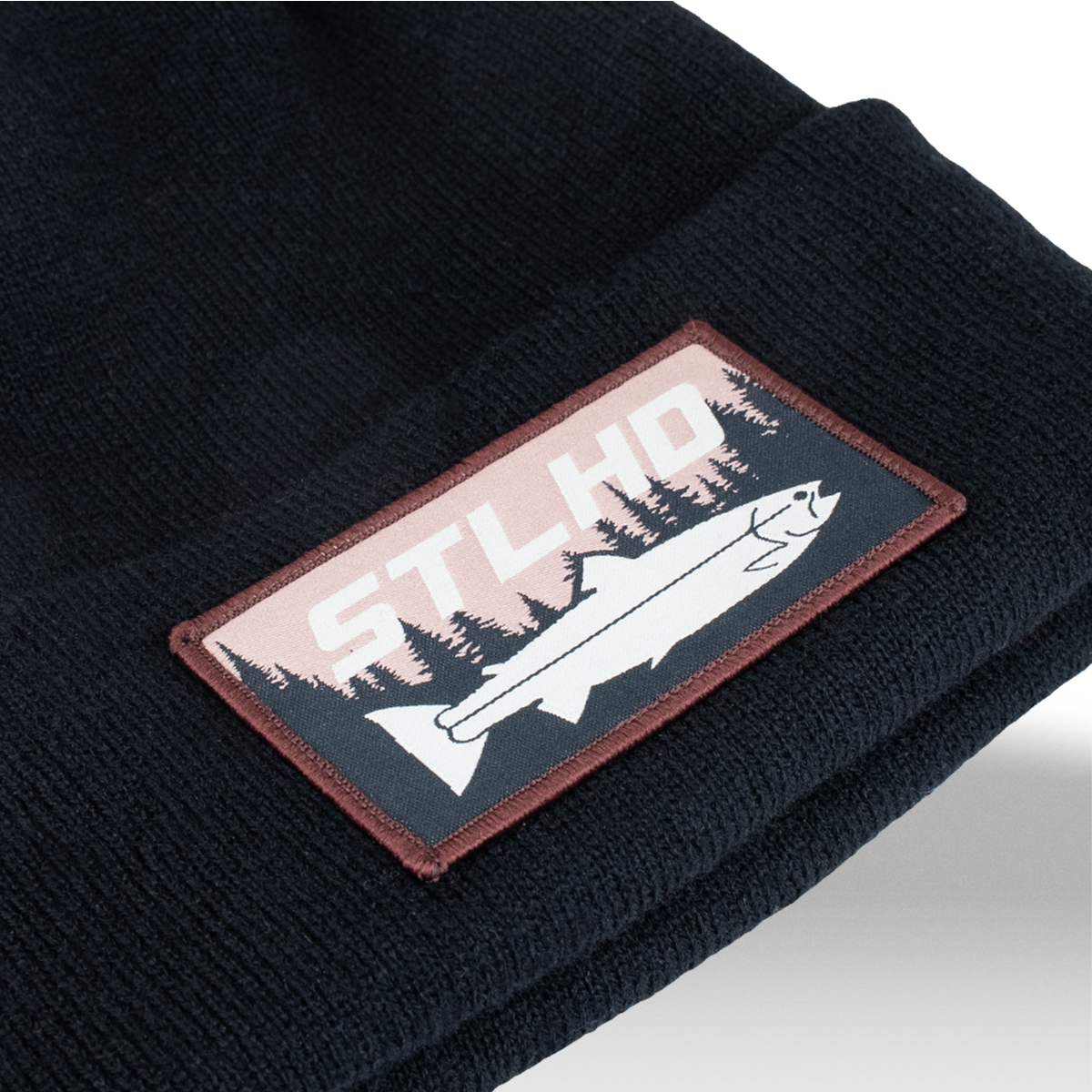 Black knit beanie with front STLHD mountain graphic leather-look patch