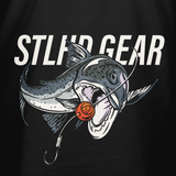 Black T-shirt close-up: STLHD GEAR lettering with fish head and orange lure