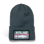 Dark teal knit beanie with ribbed cuff and rectangular STLHD patch logo