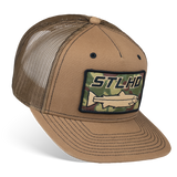 Tan 5-panel trucker cap with mesh back and stitched ST LHD logo patch