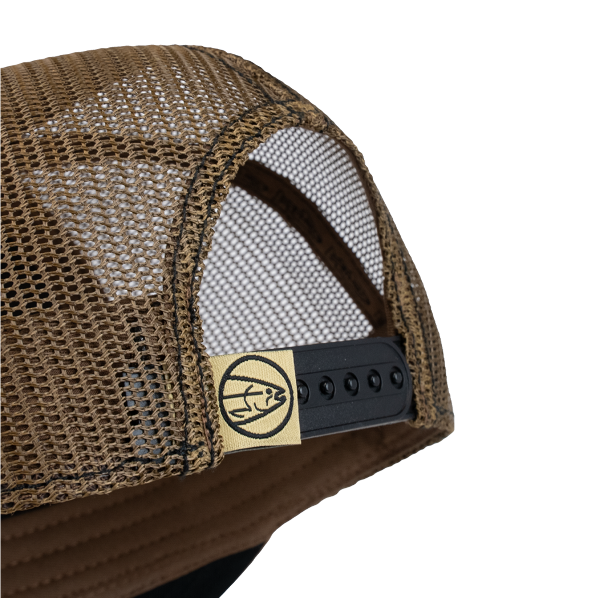 Tan mesh back trucker cap with black adjustable strap and side eyelets