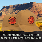 Two tan canvas caps with red-edged STLHD Gear patch, curved brim and top button