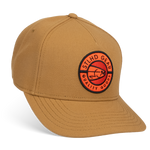 Tan canvas baseball cap with round STLHD Gear Quality Goods patch on front