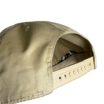 Khaki dad hat back with adjustable strap and fabric interior tag
