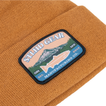 Brown knit beanie with embroidered mountain logo patch on fold-over cuff