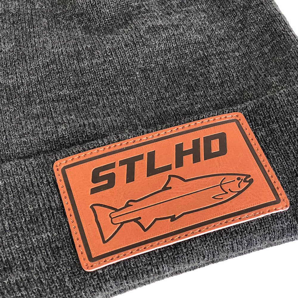 Grey knit beanie cuff with close-up STLHD leather logo patch