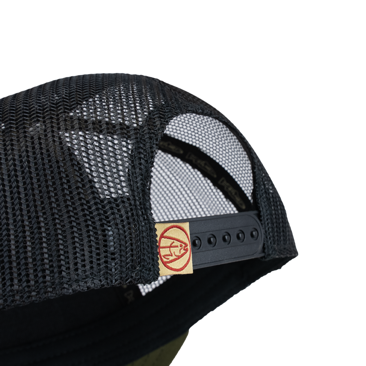 Olive green trucker cap side with black mesh and circular STLHD logo tag