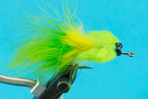 Fuzzy fishing lure with bright yellow chartreuse tuft and metal clip