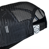 Black trucker cap with textured mesh side panels and black adjustable strap