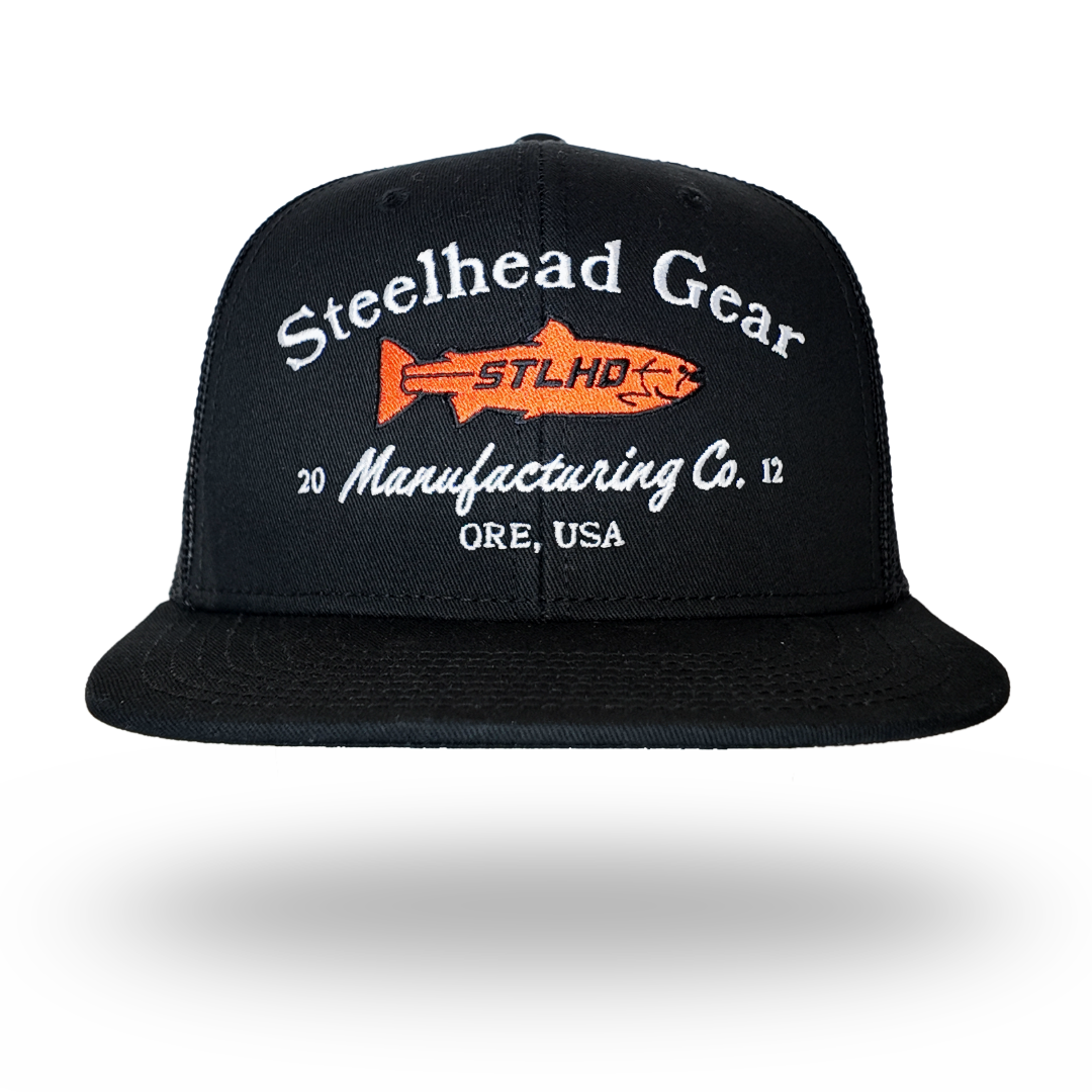 Black flat-bill trucker cap front view with Steelhead Gear and Manufacturing Co. text