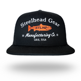 Black flat-bill trucker cap front view with Steelhead Gear and Manufacturing Co. text