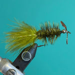 Fishing lure with yellow-green marabou body and metal propeller blade tail